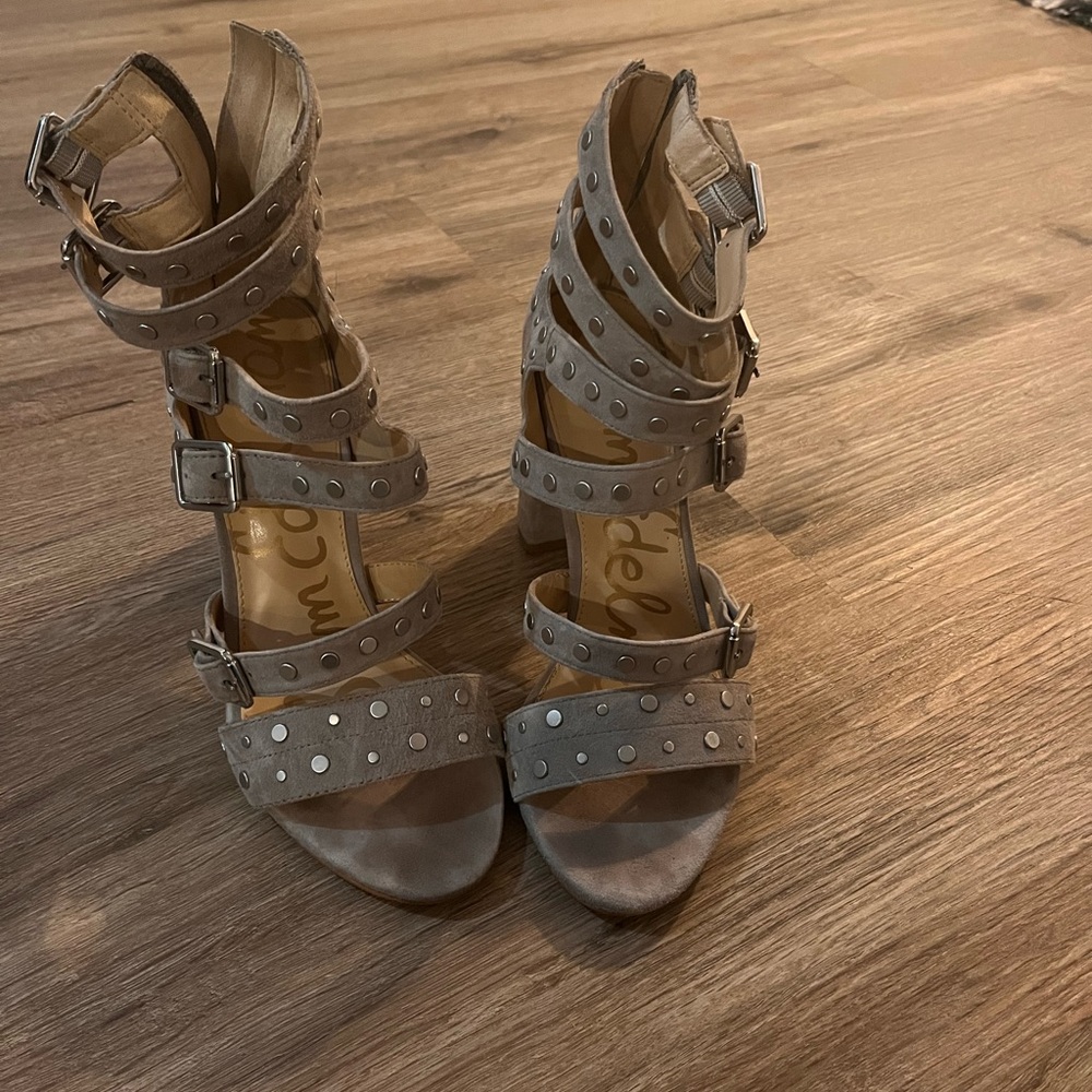 Gray rhinestone open-toe shoe.